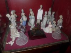 A collection of porcelain figures and tw