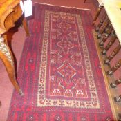 A fine North East Persian Belouch rug wi