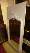 A distressed plated wall mirror the beve