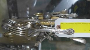 A collection of silver forks, spoons and
