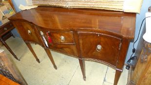 A Georgian style mahogany sideboard the