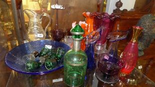 A collection of coloured glassware