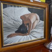 An oil on canvas naked female on bed by Lee Jones Denise