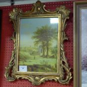 A wall plaque Italianate study in gilded