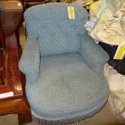 A Victorian mahogany armchair upholstere
