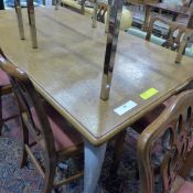 A French parquetry top draw leaf dining