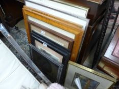 A collection of various prints framed an
