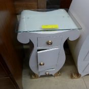 A white painted multi drawer chest and m