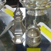 A hallmarked silver sugar castor and a s