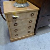 A satinwood chest of small proportions f