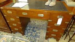 A Campaign style pedestal desk the green