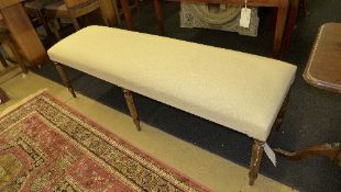 A mahogany window seat/long stool with g