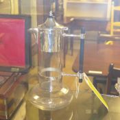 A silver plated dresser style claret jug