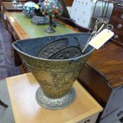 A collection of brassware