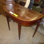 A George III mahogany inlaid table the f