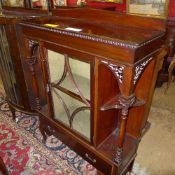 An Edwardian mahogany display cabinet wi