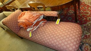 An Edwardian mahogany chaise lounge upho
