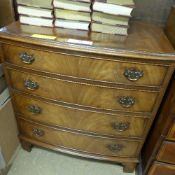 A C20th mahogany bowfront chest having f