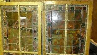 A pair of painted and stained panel doors
