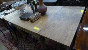 A C19th pollard oak draw-leaf dining tab