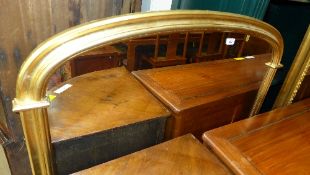A gilt overmantle mirror