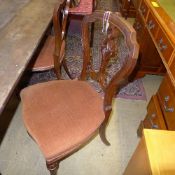 A set of four Victorian carved mahogany