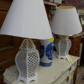 A pair of blanc de chine pierced table l
