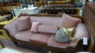 A Victorian mahogany double scroll end s