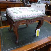 A French C19th walnut footstool with pad