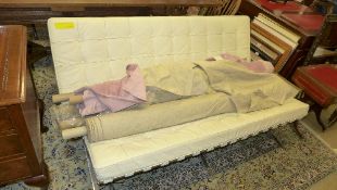 A Barcelo design two seater bench with white leather cushions on chromium base
