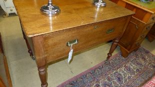 A late C19th mahogany side table the rectangular top above deep drawer raised on turned supports