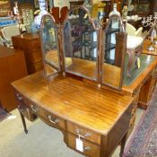 A C20th mahogany dressing table the trip