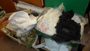 A collection of lace, linen and a fan
