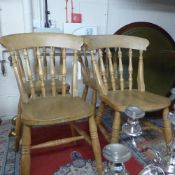 A set of three pine kitchen chairs