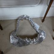 A chromium novelty wall mount (shark jaws)