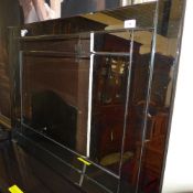 A Venetian wall mirror with segmented bo