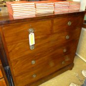 A Victorian mahogany chest having two short above three long drawers on feet