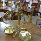 A set of brass weighing scales