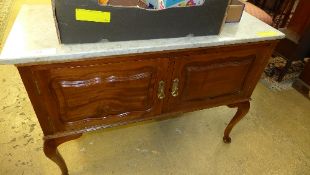 An Edwardian marble top washstand with c