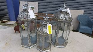 A set of four Vienna design storm hanging lanterns