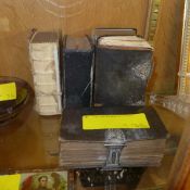 A set of five silver plated mounted bibles