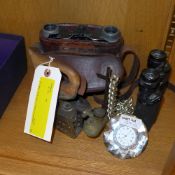 A collection of binoculars, silver cross