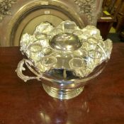 A silver plated caviar set