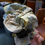 A collection of various pairs of curtains