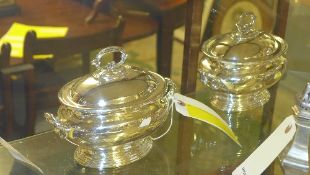 A pair of silver plated tureens