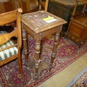 A French oak and marble inset jardiniere