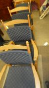 A pair of C20th designer open armchairs