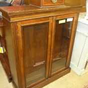 A late Victorian walnut dwarf bookcase t