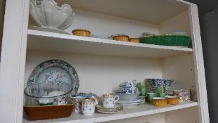 A collection of pottery including wall p
