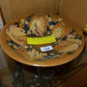 A William Moorcroft dish of circular for
